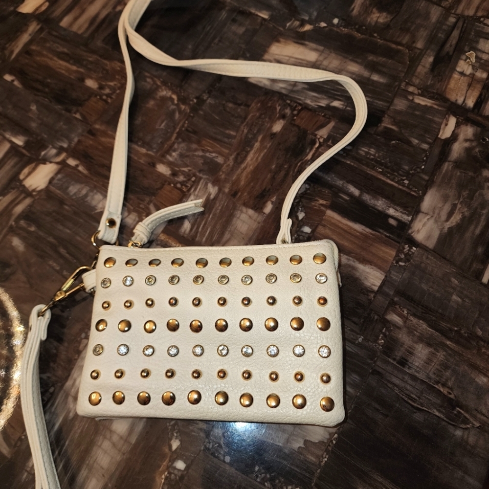 Metallic stud and rhinestone crossbody and clutch